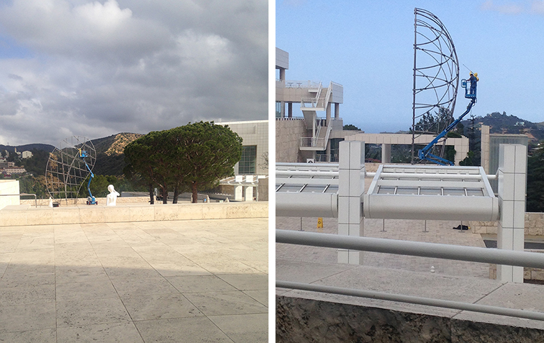 Two photographs showing a sculpture being cleaned in the grounds of the Getty Museum in Los Angeles.