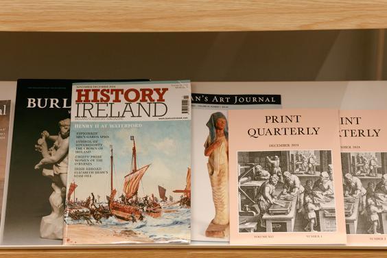 Copies of magazines such as History Ireland and Print Quarterly on a shelf.