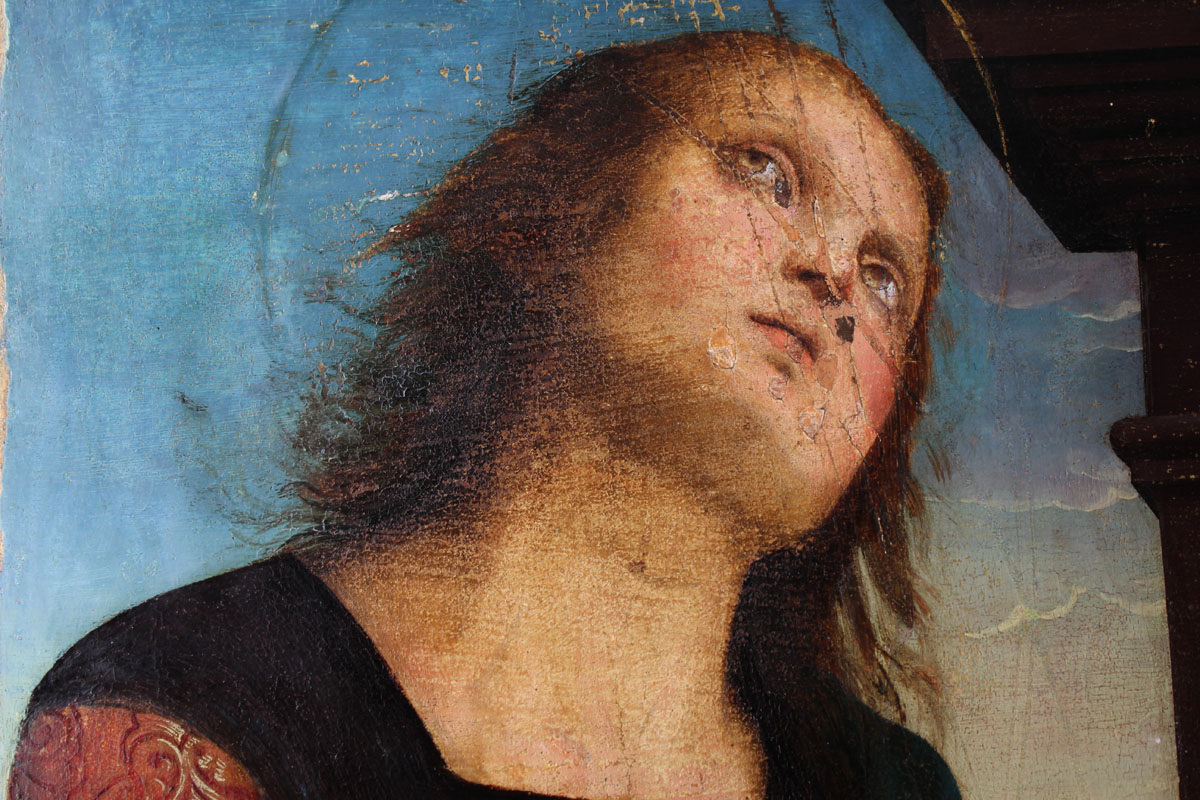 Detail from Perugino's 'The lamentation over the dead Christ' showing the figure of Nicodemus after cleaning, but before restoration. 