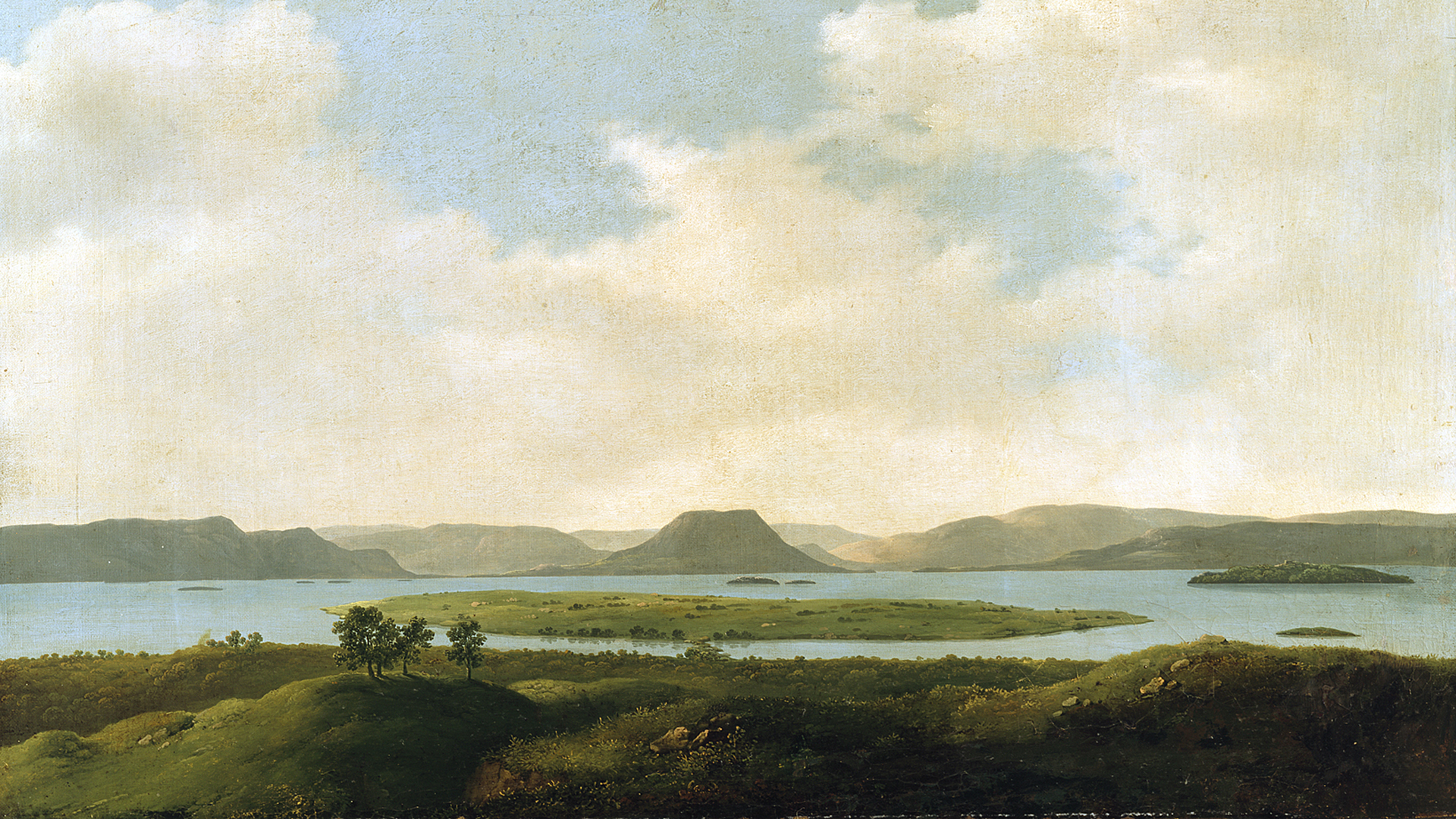 Landscape painting of a lake with a grassy island and mountains in the distance