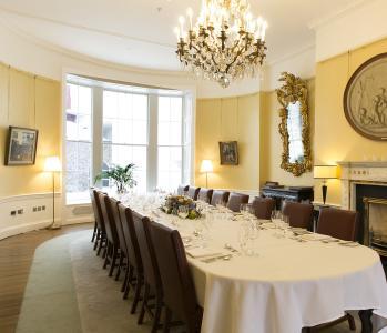 Photo of a board room set up for a dinner event in a Georgian building
