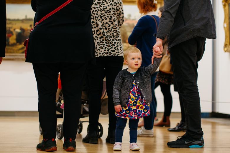 A young child on a free family friendly tour in the Millennium Wing. © National Gallery of Ireland