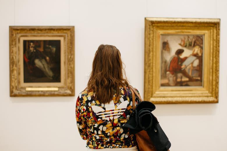 A visitor inside the exhibition rooms of the Millennium Wing. © National Gallery of Ireland.