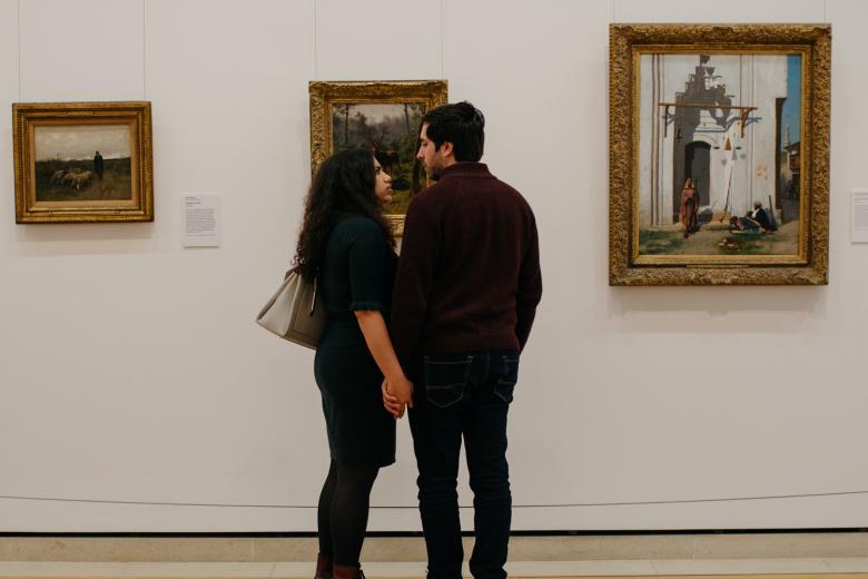 Visitors in front of Rosa Bonheur's A Stag in the National Gallery of Ireland.