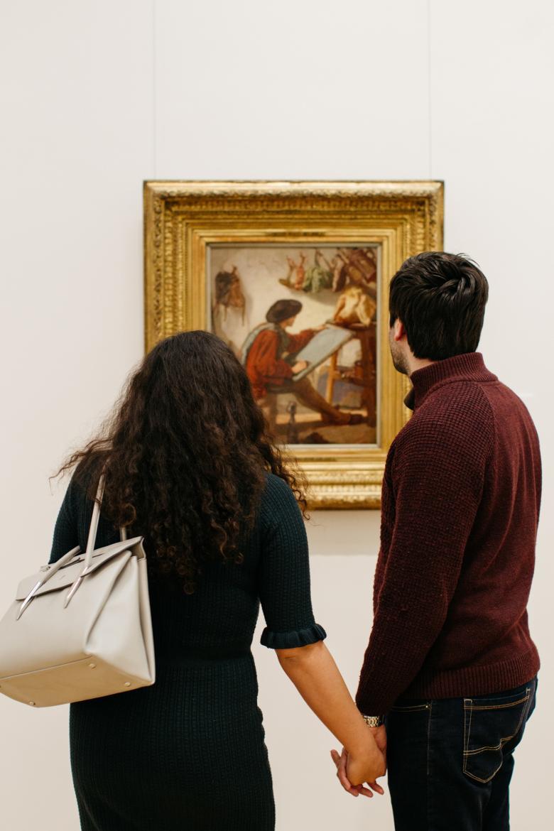 A couple in front of Thomas Couture's La Peinture Realiste. © National Gallery of Ireland.
