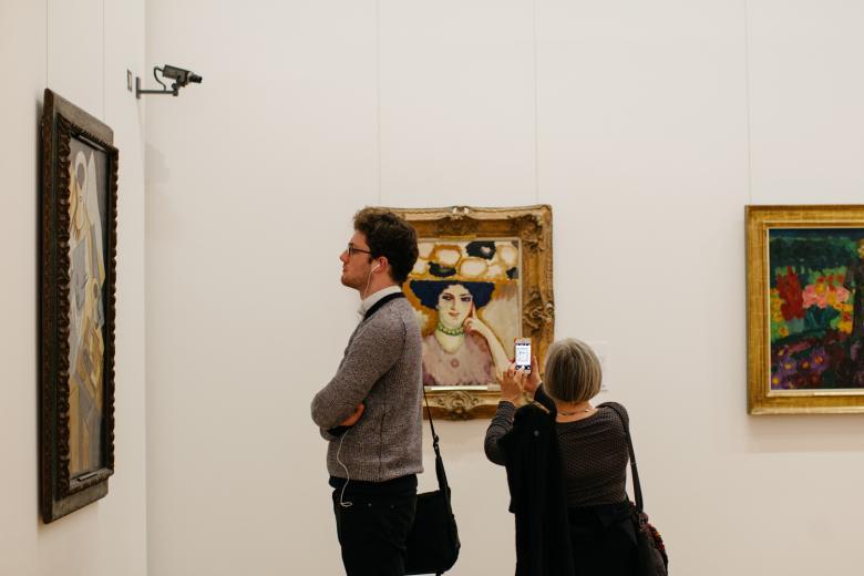 A man in the Millennium Wing exhibition rooms. © National Gallery of Ireland.
