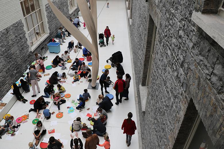 An aerial view of a drop-in family workshop taking place in the Courtyard in the National Gallery of Ireland.