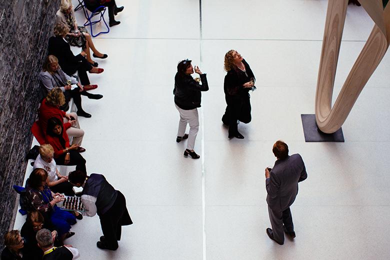 Photo taken from a high viewpoint looking down at a group of people in the courtyard of the National Gallery of Ireland.