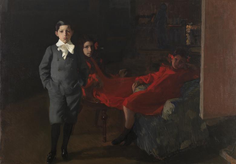 Dark oil painting portrait of a young boy standing and two girls dressed in red slouched on chairs.
