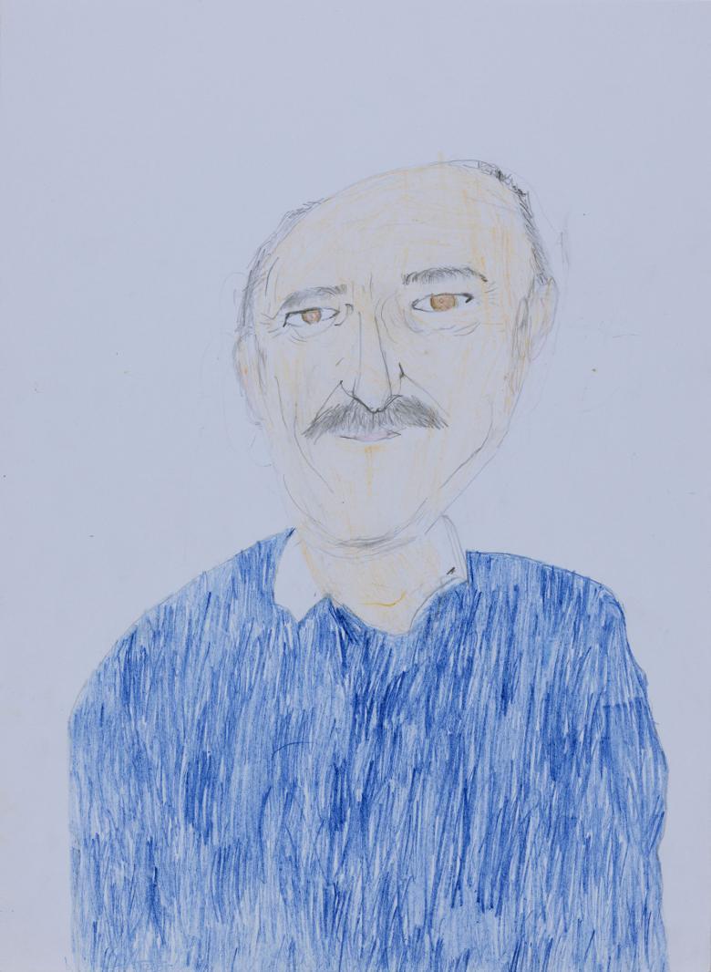 A half-length portrait of a man wearing a blue jumper over an open necked white shirts. He has a thick, dark moustache, and his brown eyes have smile lines around them. 
