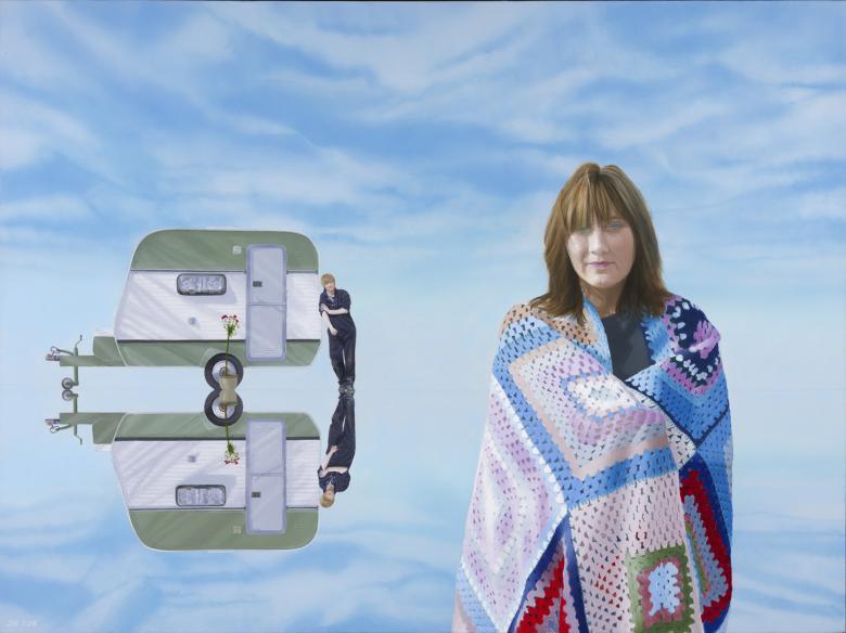 In the right foreground stands a female figure, wrapped in a colourful crochet blanket. In the background is a caravan, which is not hitched to anything. Leaning against it is a figure dressed in dark overalls. There is a plant beside the caravan's door, and the caravan, the figure and the plant are all reflected in the blue surface below. 