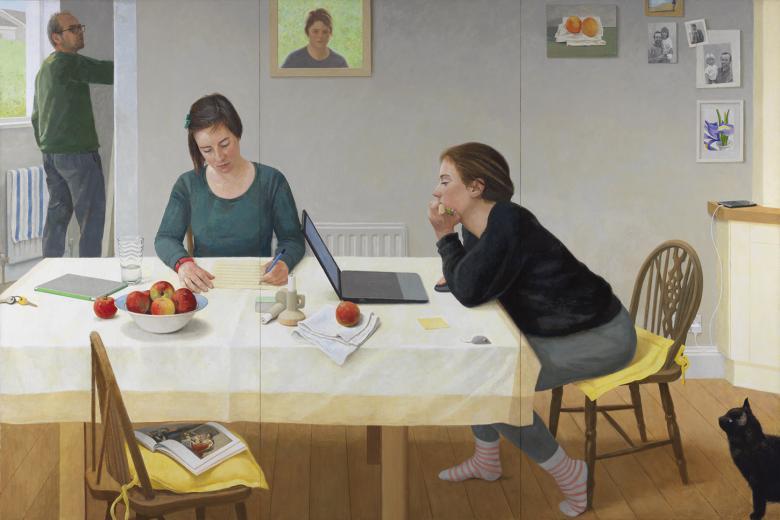 Two young people sit at a table, working. One is looking at a laptop in concentration while the other is writing. The table is filled with objects of daily life - keys, apples, a cloth, a glass of water. A small mouse is also on the table, and a cat in the right hand corner stares up at it. On the walls are family photographs and drawings. Through a doorway we see a male figure in a green jumper, and the glimpse of greenry through the window. A fourth figure is visible in a frame over the heads of the girls