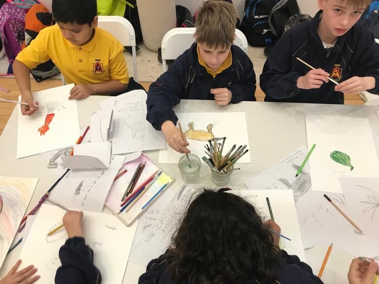 School kids drawing at a workshop in the Gallery