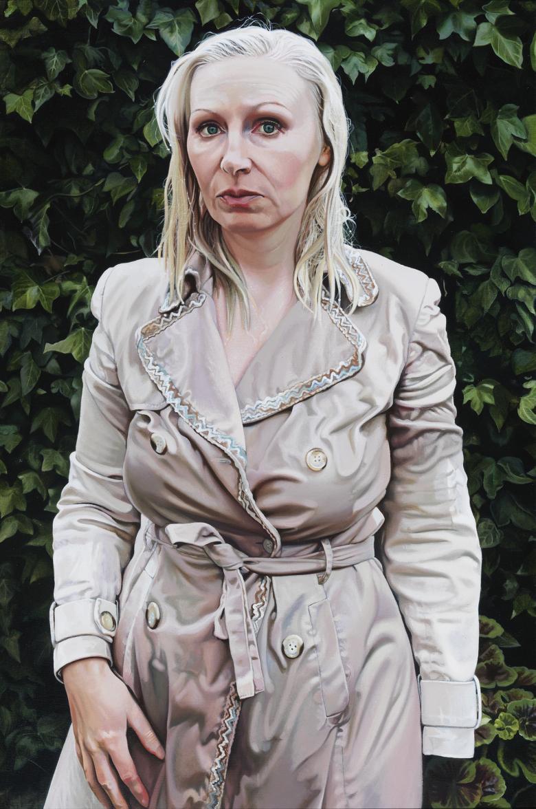 A photorealist painting of a woman standing in a mac. Her hair looks wet, and her coat is damp.