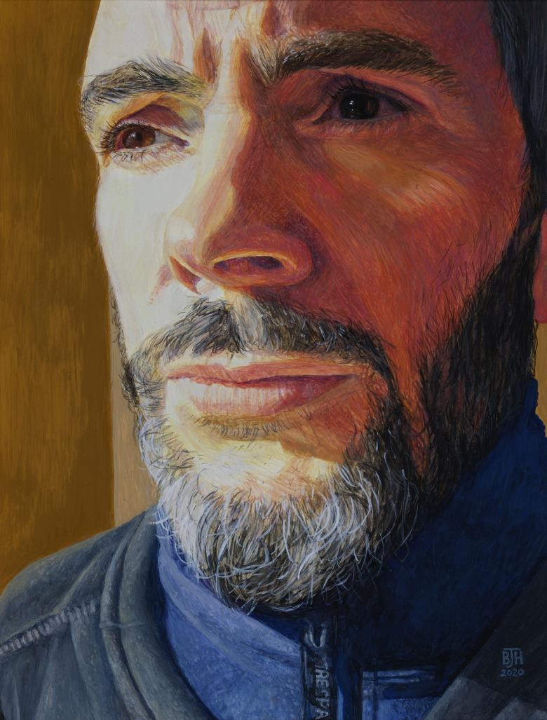 Close-up view of a bearded man's face