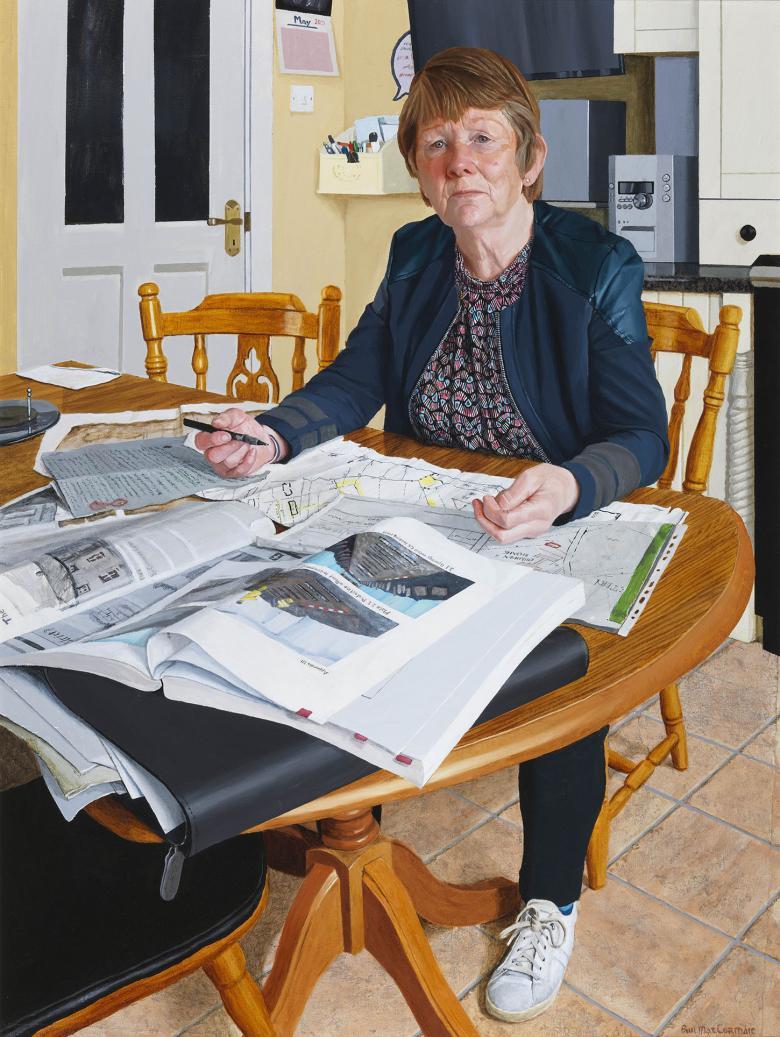 Realistic portrait of a woman with short brown hair seated at the kitchen table with papers spread in front of her