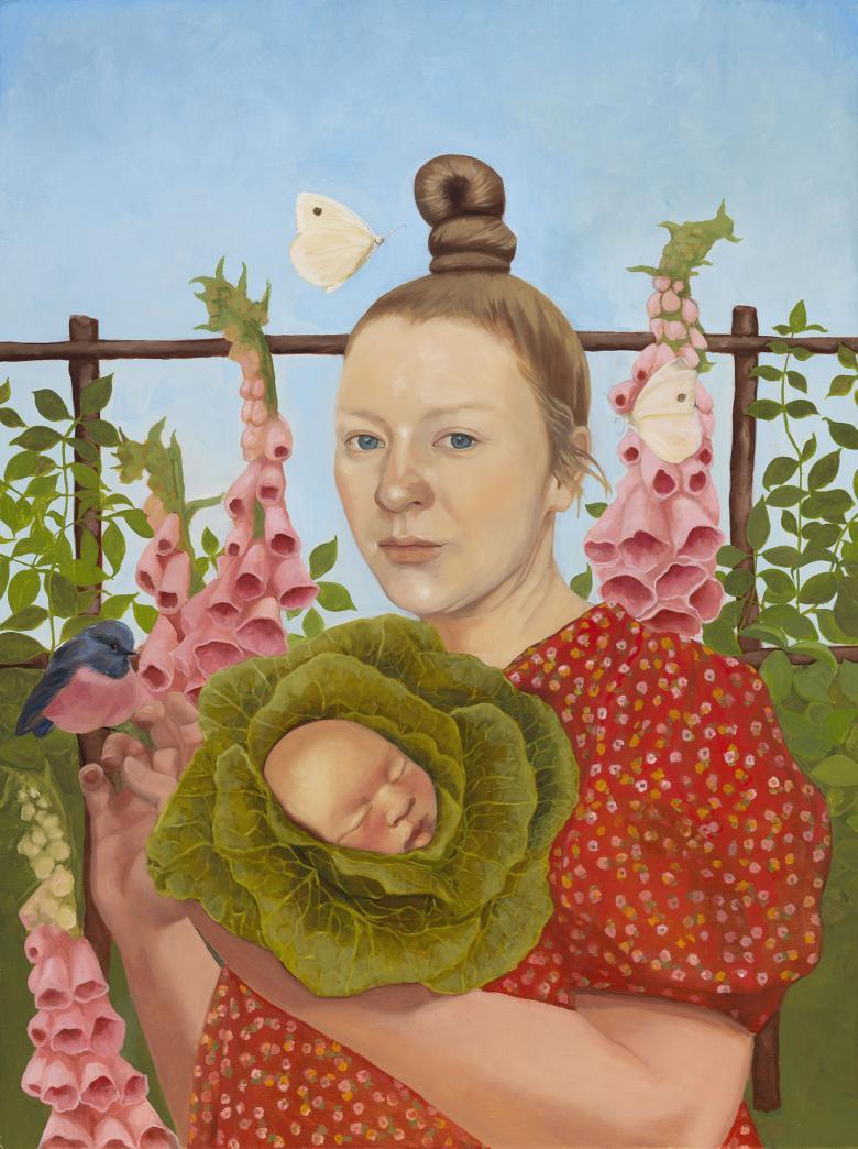 Vibrant portrait of woman standing in a garden with foxgloves while holding a cabbage which has a baby's head at the centre