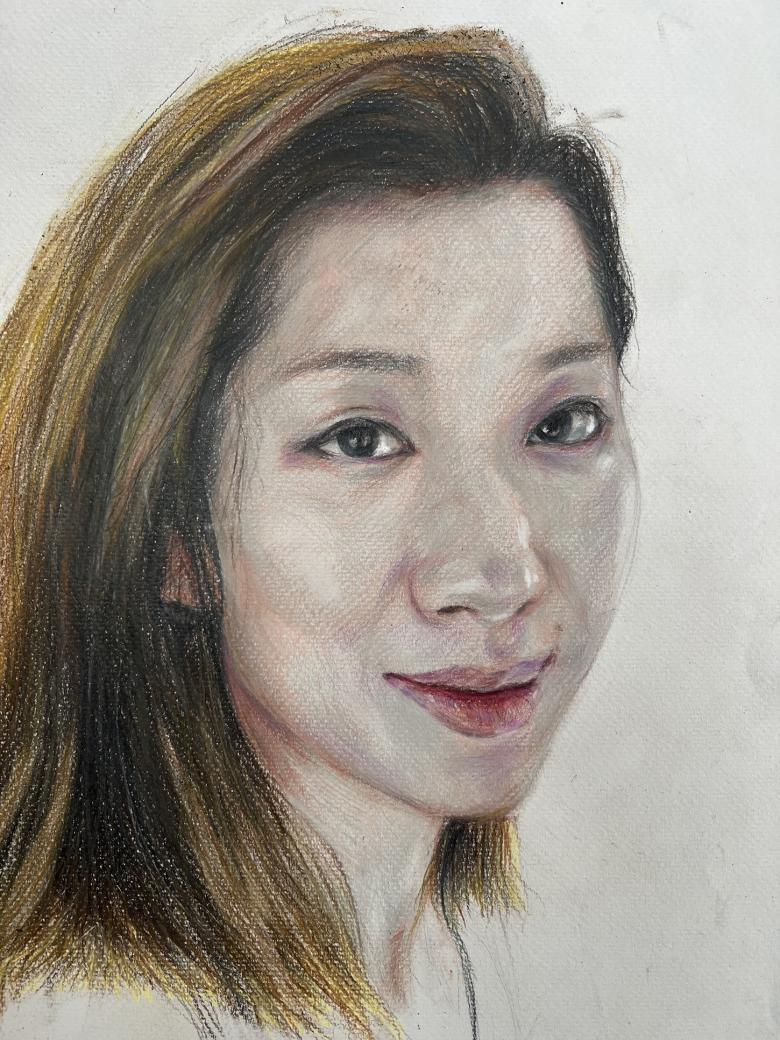 Drawing of a female figure with brown eyes and short brown hair on a grey background