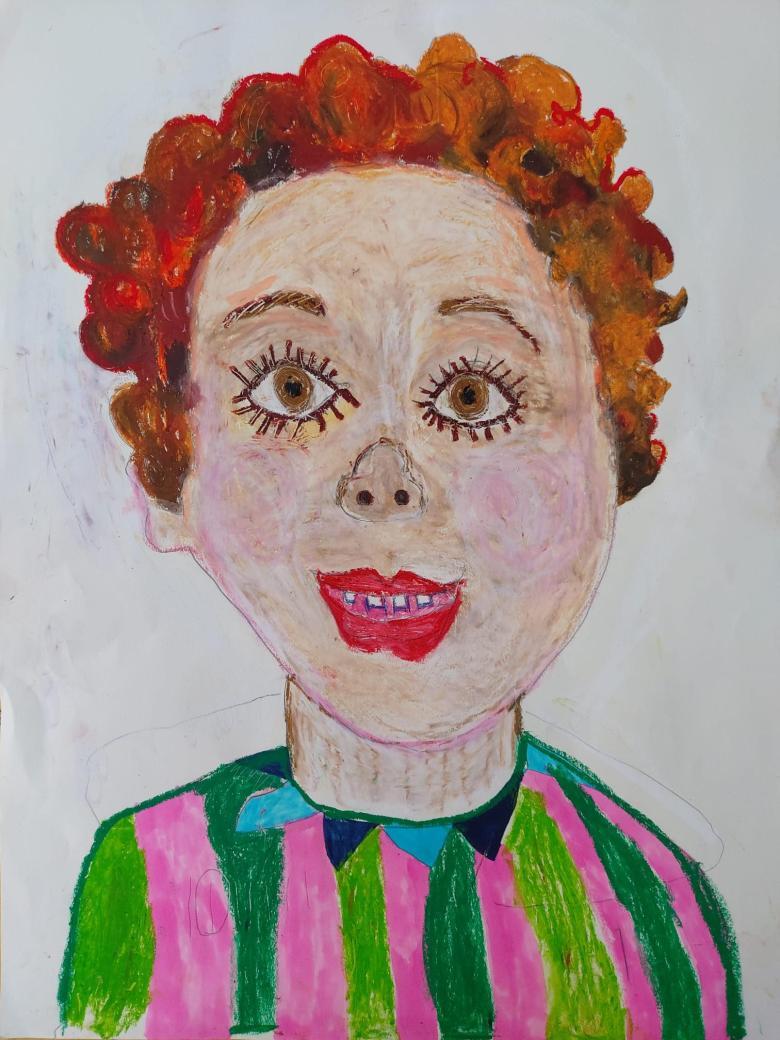 Drawing of a young boy with red curly hair and a green and pink striped top