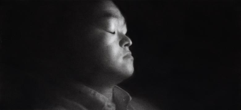 Black and white photograph of a face in profile