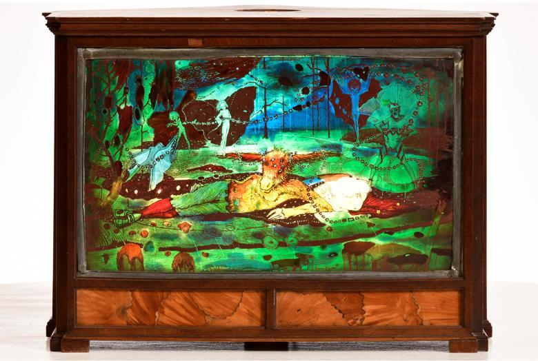 Stained glass panel of two figures reclining on green fields, surrounded by fairies.