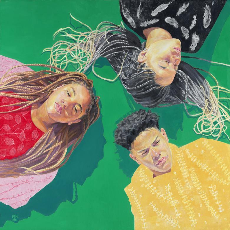 Three young people lie on a bright green background, making a triangular shape on the canvas, their heads almost touching. In the bottom right corner, a young man wearing bright yellow; to the right, a young woman in pink and red, her hair over her shoulders; in the top right, another young woman in black and white, eyes closed and hair spread out on either side of her. 