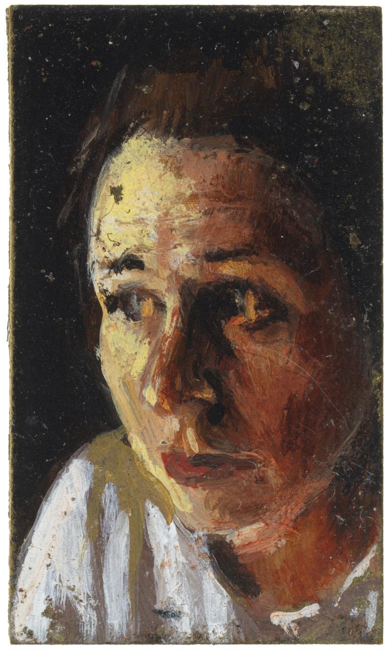 A close up portrait of a woman's head, turned slightly to the side and illuminated by a warm yellow light.