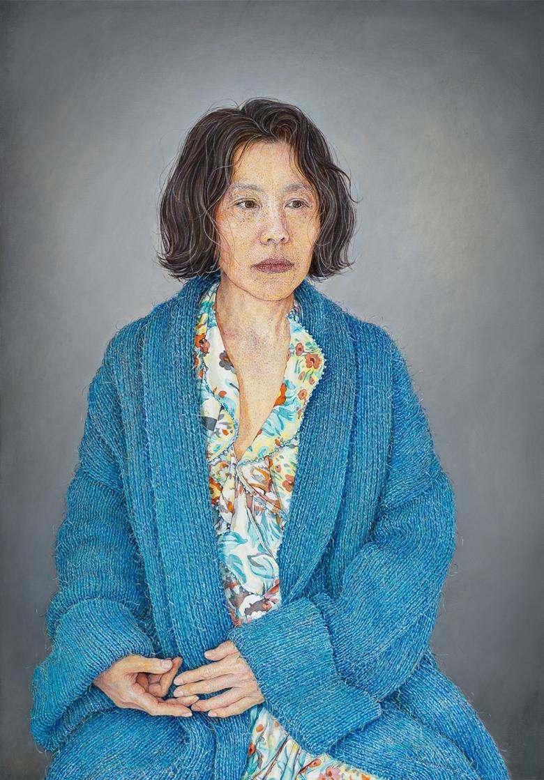 A painting of a young woman with short brown hair wearing a blue robe.