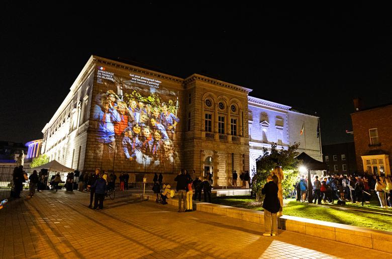 The facade of the Gallery is illuminated with projections