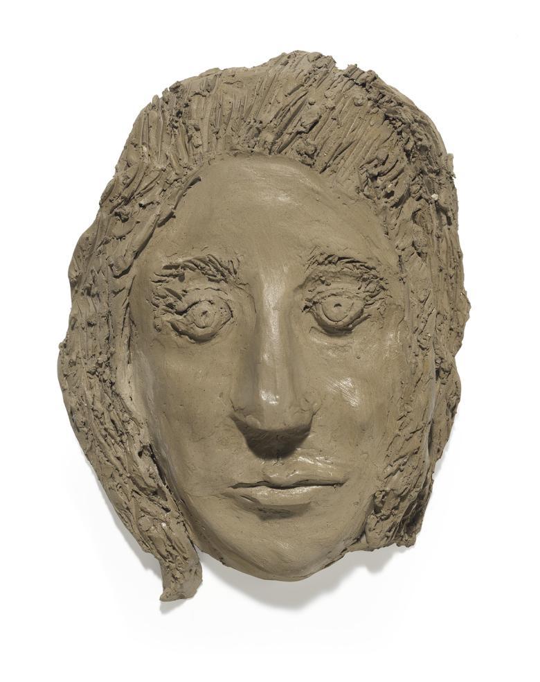 A clay sculpture of a head