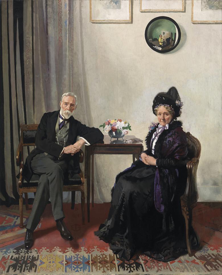 Double portrait in oils of an older man and woman seated at a small table in an interior, with a convex mirror hanging above them on the wall reflecting the artist at work..