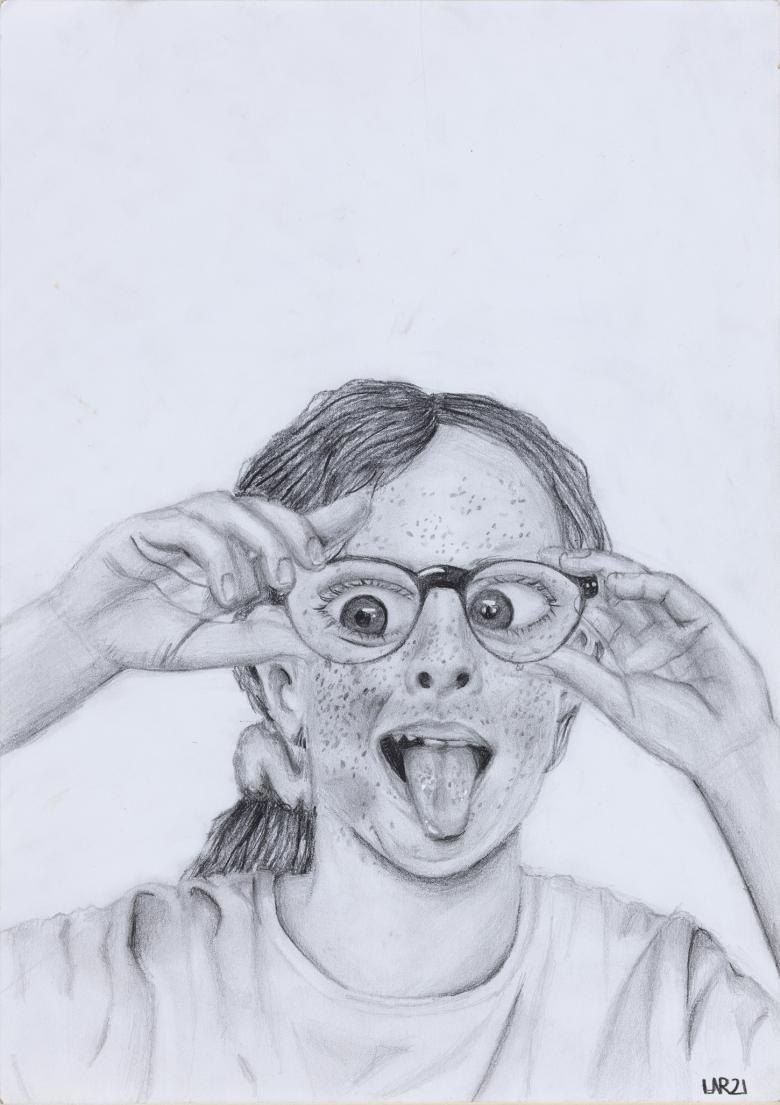 Child's detailed pencil drawing of a bust-length portrait of a girl with her tongue sticking out, holding the sides of her glasses which have magnified her eyes