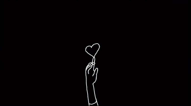 Video still of an animated white line drawing on a black screen. A hand is reaching up and touching a floating heart