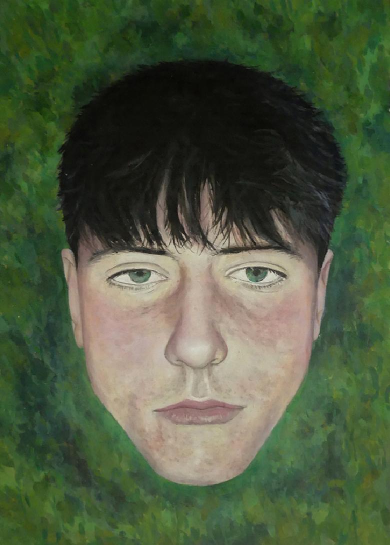 Animated video still of a young man's face floating against a green background