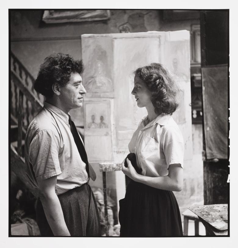 Black and White photograph of  Alberto et Annette Giacometti in a studio.