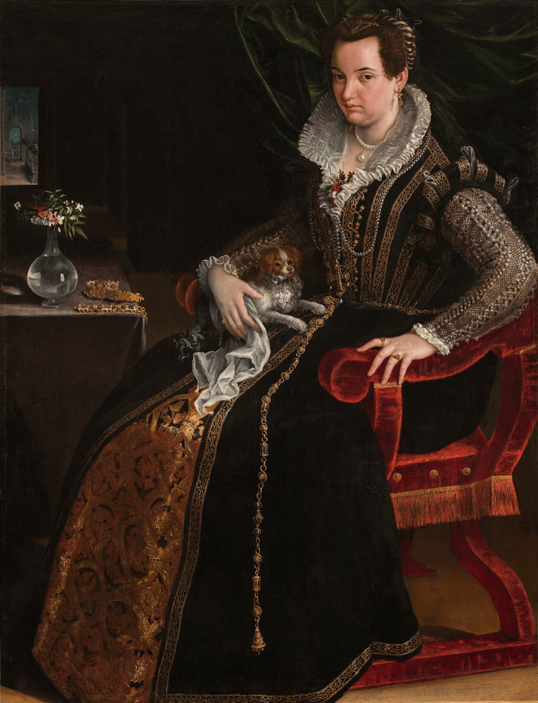 Painting of a female figure in an elaborately decorated black dress with white lace collar, sitting on a red velvet chair holding a small dog
