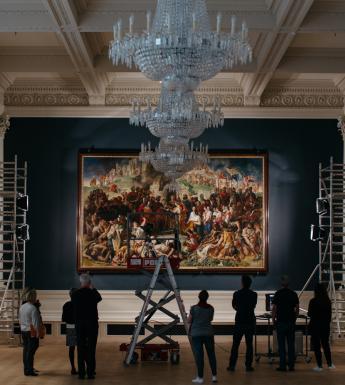 Rehanging the Marriage of Strongbow and Aoife painting in the Gallery's Shaw Room