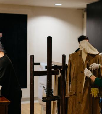 Two women preparing archival items