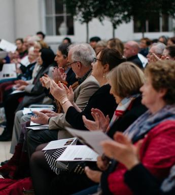Visitors listening to a recital by the Royal Irish Academy of Music in the Wintergarden. © National Gallery of Ireland.