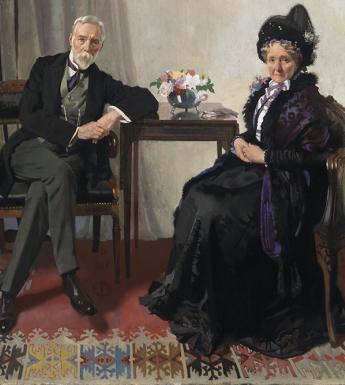 Double portrait in oils of an older man and woman seated at a small table in an interior, with a convex mirror hanging above them on the wall.