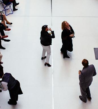 Photo taken from a high viewpoint looking down at a group of people in the courtyard of the National Gallery of Ireland.