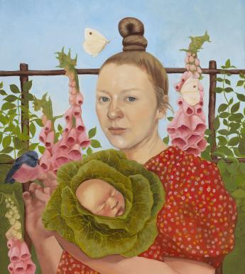Vibrant portrait of woman standing in a garden with foxgloves while holding a cabbage which has a baby's head at the centre