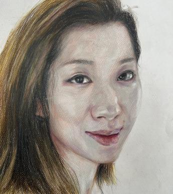 Drawing of a female figure with brown eyes and short brown hair on a grey background