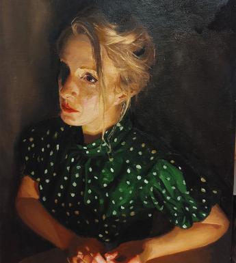 Painting of a female figure with blonde hair and a green spotted top in low light