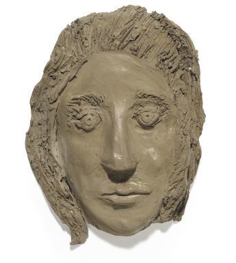 A clay sculpture of a head