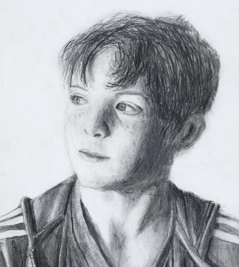 A pencil drawing of a young boy. His hair is tousled, and he is looking off to the side so his head is in three-quarter profile. 