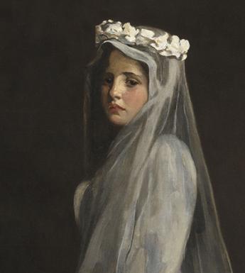 Portrait of a young girl wearing a white communion dress, headdress and veil.