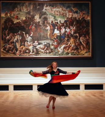 Photo of woman with rainbow flag