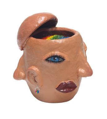 Head sculpted in clay with various facial features all around and top of skull open to reveal rainbow-coloured brain.