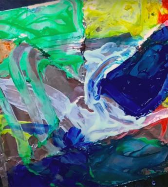 A stained glass inspired painting with colourful paint drawn by a child